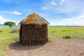 Maasai Ã¢â¬â¢s shelter, circular shaped thatch house made by women in Tanzania, East Africa Royalty Free Stock Photo